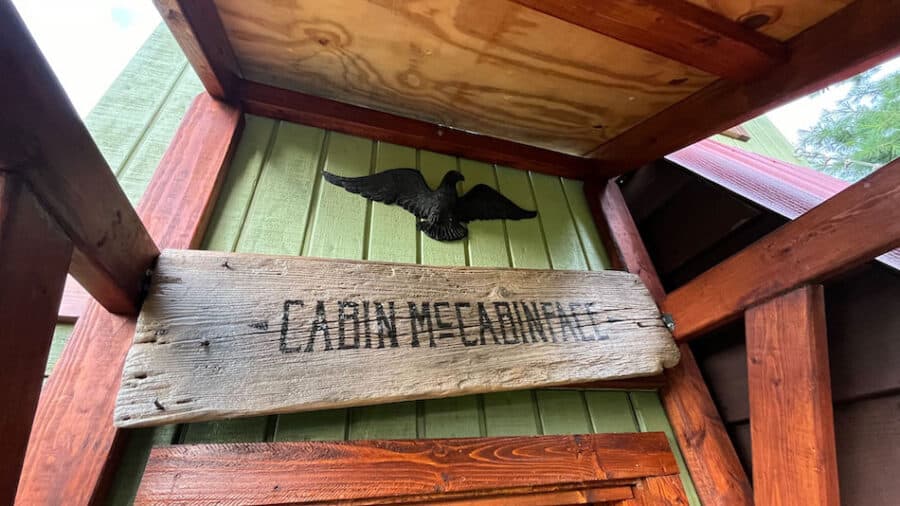 Off-Grid Cabin Sign with Bird Decor.