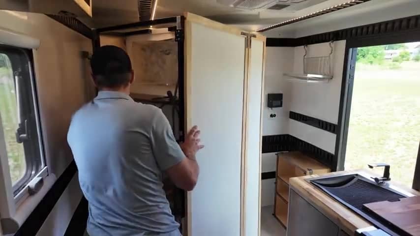 Rear expandable sunroom / patio setup — still from the NJOA tour