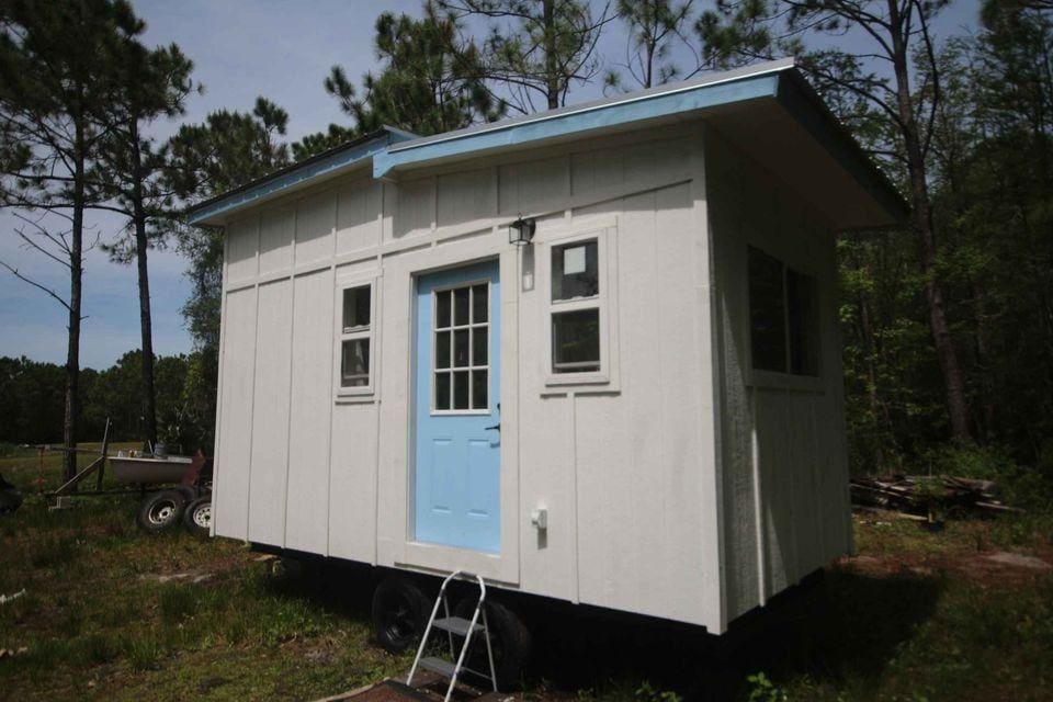 Tiny House in Houston with Blue Door
