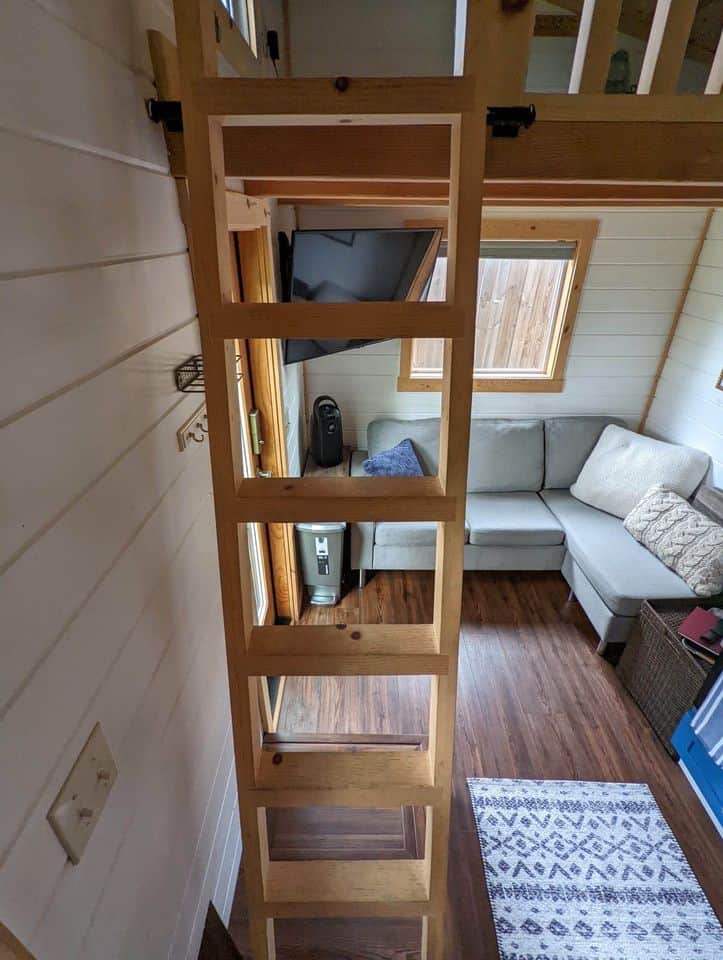 Roanoke Alta tiny house interior featuring a first-floor bedroom and compact living space.