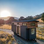 Tiny House on Wheels in Scenic Landscape.