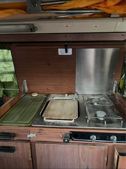 Westfalia cabinet with a sink and two-burner stove under the lid