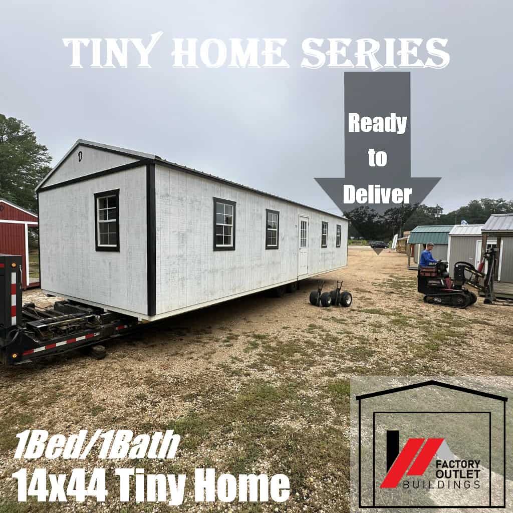 The 14x44 tiny home loaded on a trailer on the sales lot, ready for delivery