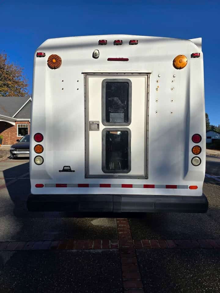 Rear of the shuttle bus with the wheelchair lift door