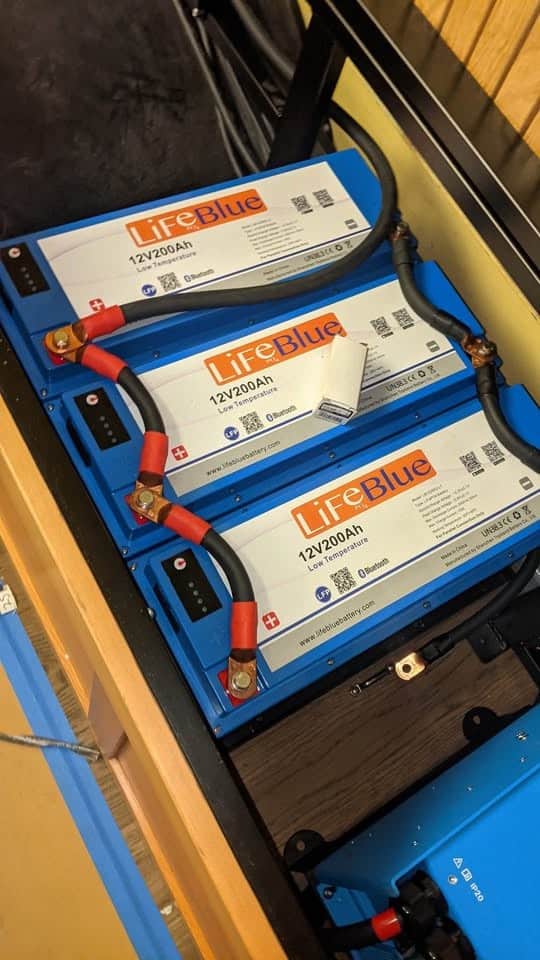 Three LiFeBlue lithium batteries installed in a compartment