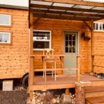Tiny House with Wood Stove for Warmth and Comfort.