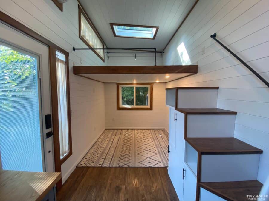 Bright tiny house interior with modern design and natural light.