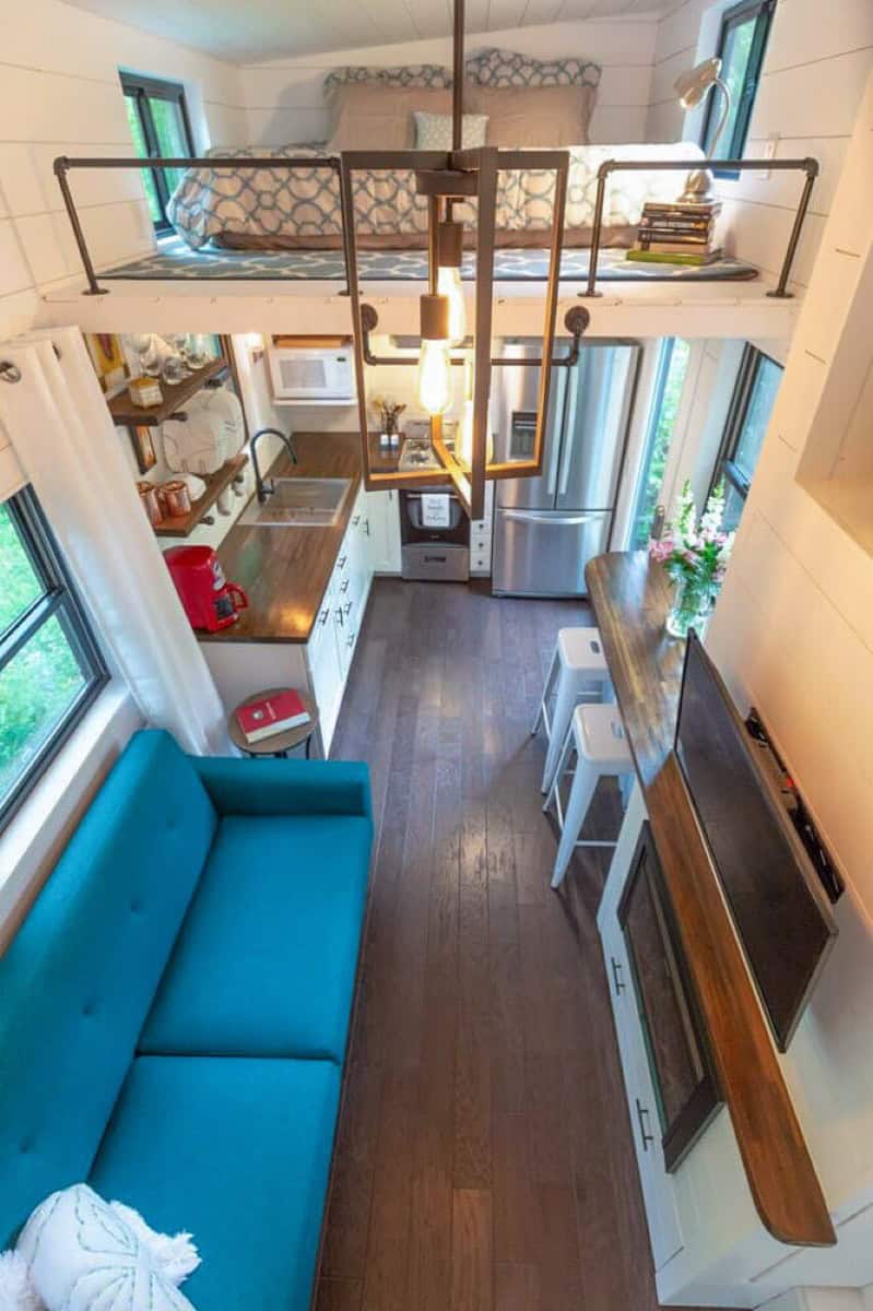 Built-in wall storage solutions throughout the tiny house