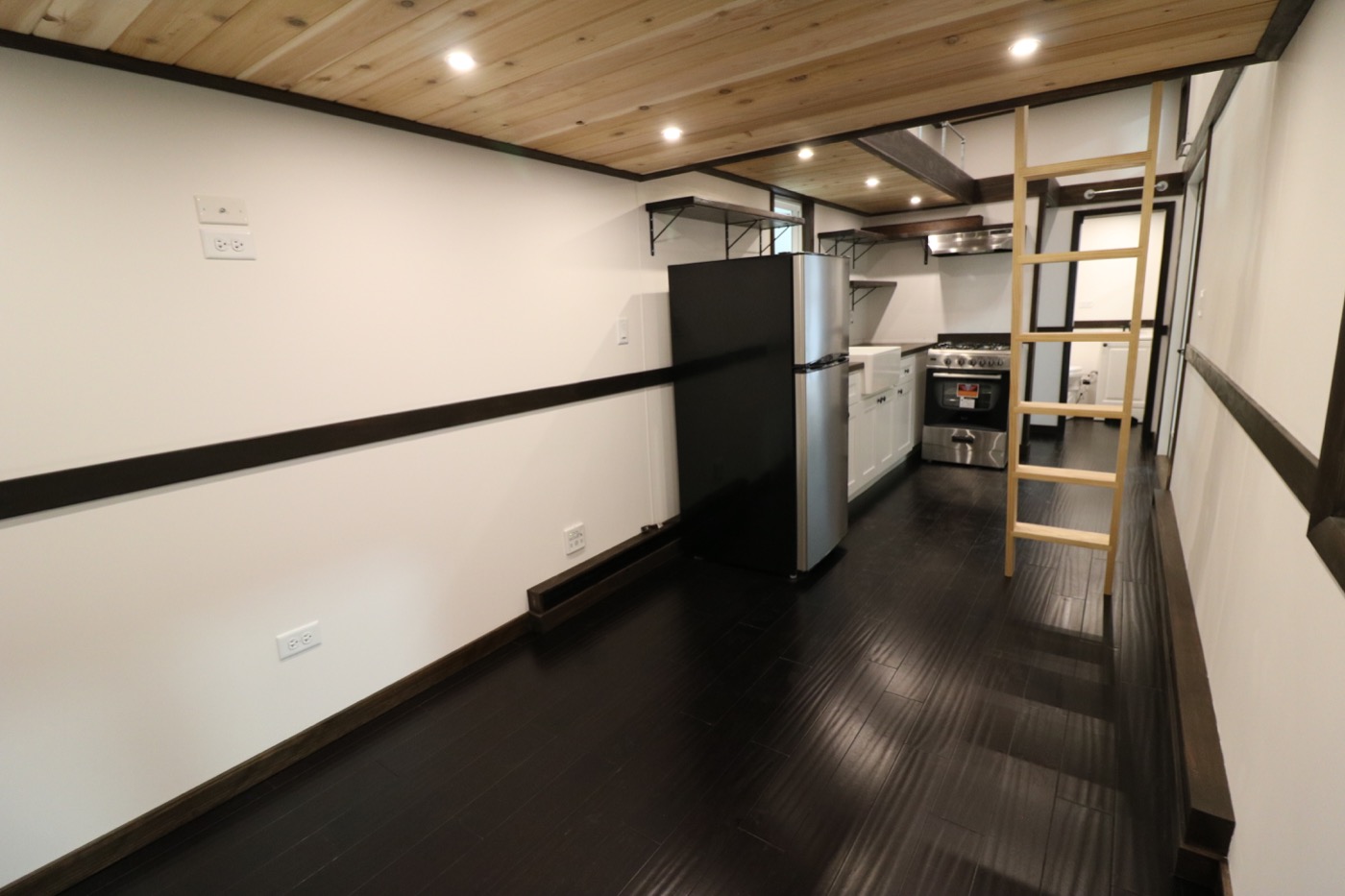 Family of Three’s Off-Grid Tiny House with 12ft Loft-to-Loft Catwalk - Tiny Off Grid Homes With Loft