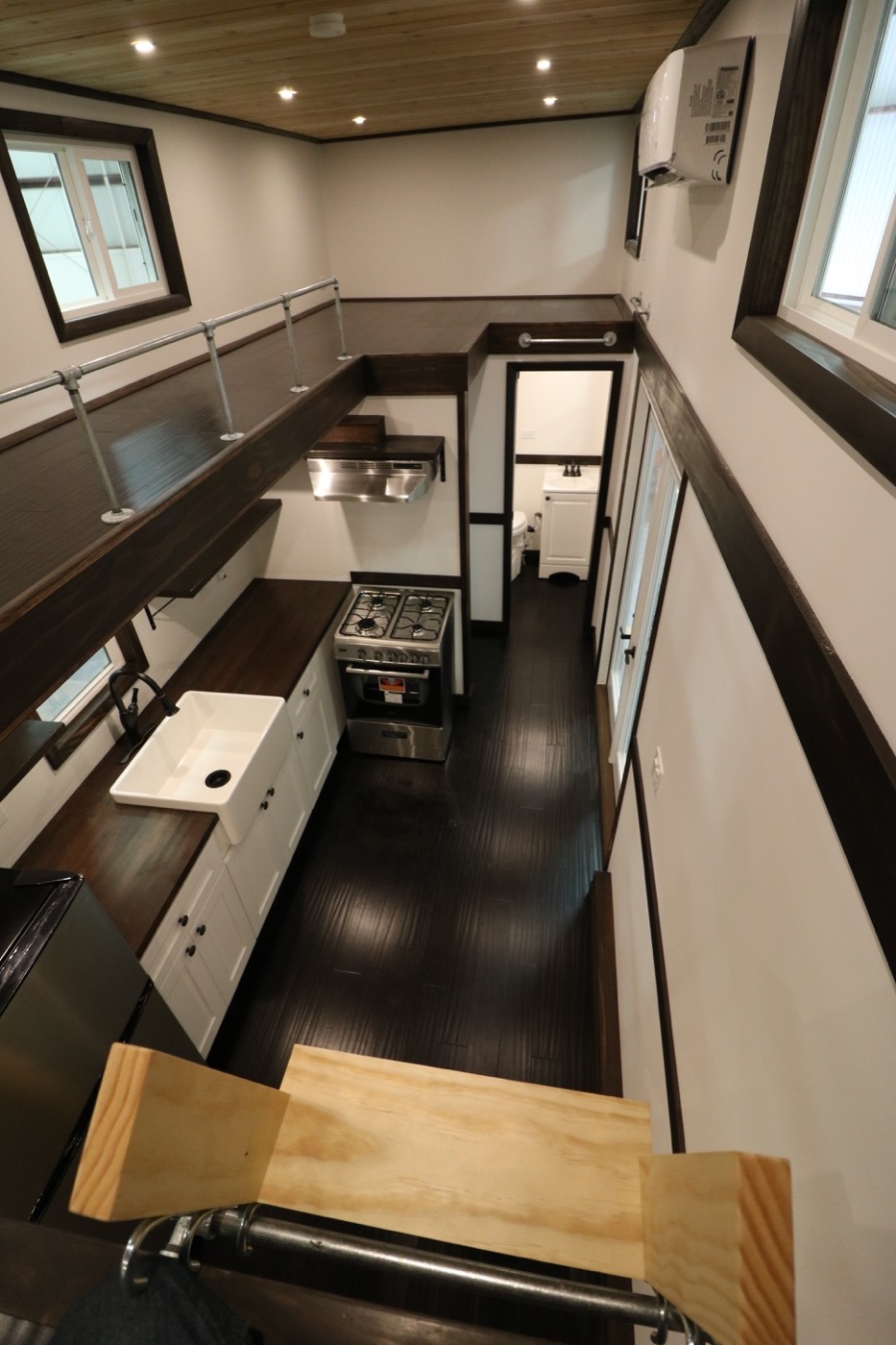 Picture of Family of Three’s Off-Grid Tiny House with 12ft Loft-to-Loft Catwalk