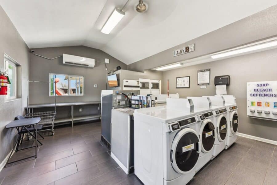 Small laundry room with washers and dryers at Lone Star RV Resort near Austin.