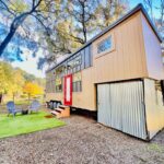 Tiny house on wheels with modern design in California.