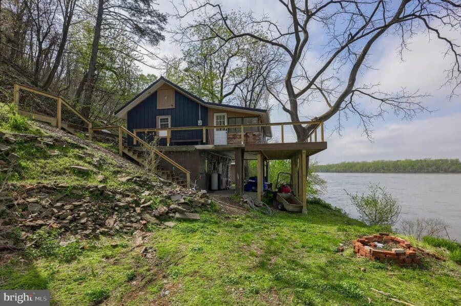 An inviting tiny house nestled on 3 acres in PA, offering scenic views and small-space living in a p.