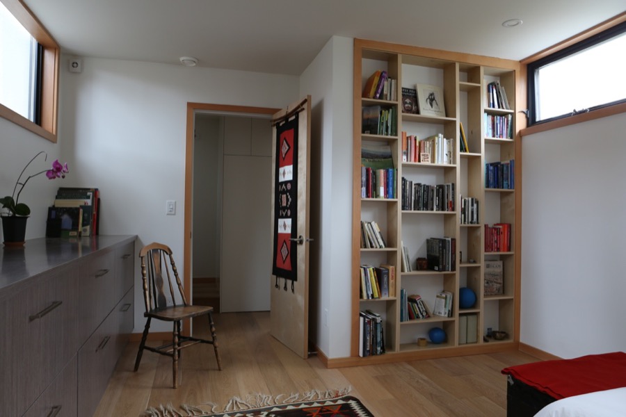 built-in bookshelf in bedroom