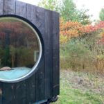Tiny House in Toronto With Large Round Window