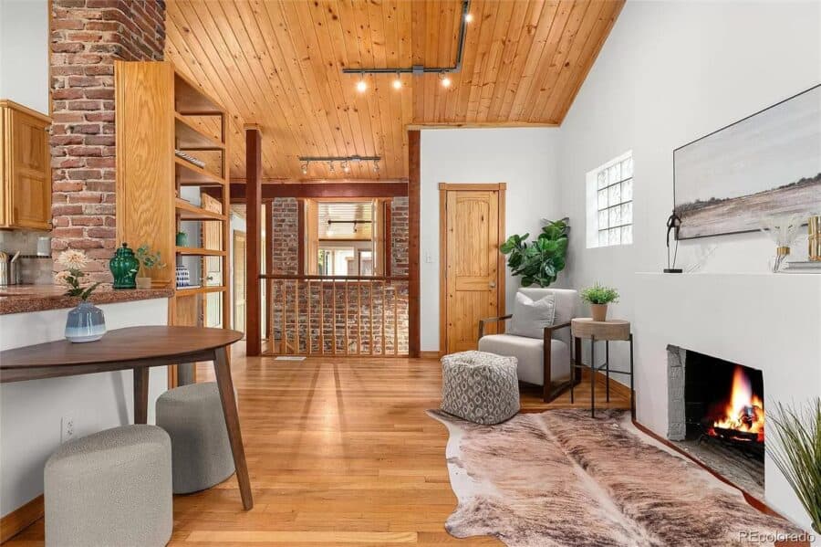 Charming 786 sq. ft. Spanish-style home with warm wood accents and modern decor. Perfect for small s.