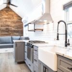 88k Farmhouse tiny house w main floor bedroom and super nice bathroom via Liberation Tiny Homes 002