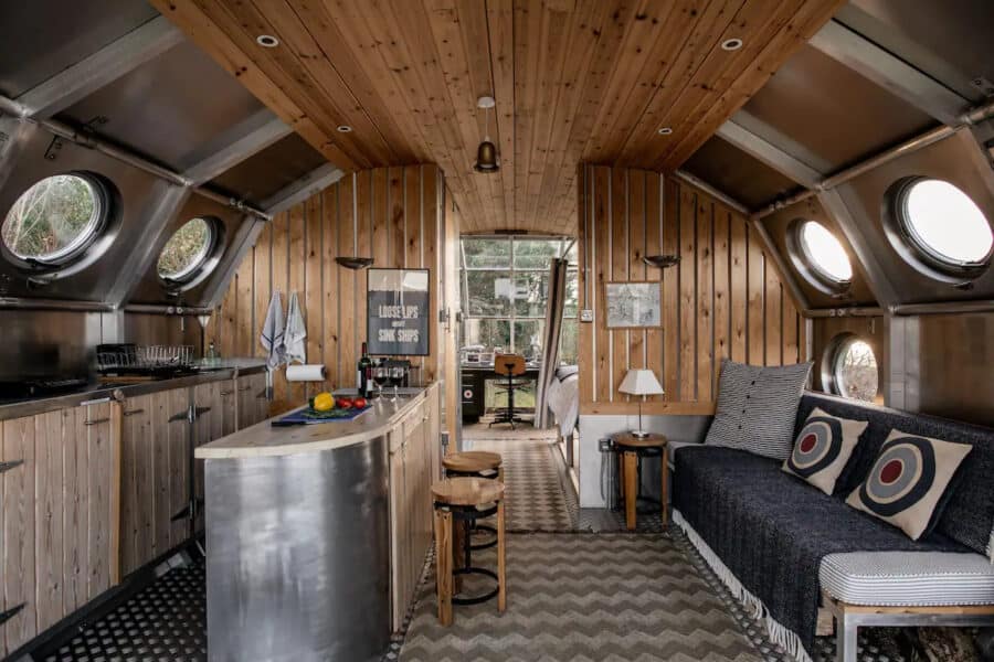 AirShip 2 tiny house interior with unique dragonfly eye windows in Scotland.