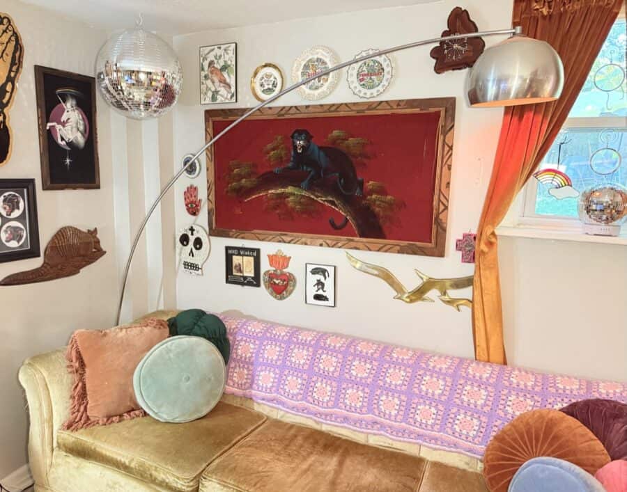 Eclectic vintage-filled apartment with colorful decor and unique art pieces.