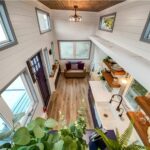 Compact tiny house living space with modern design.