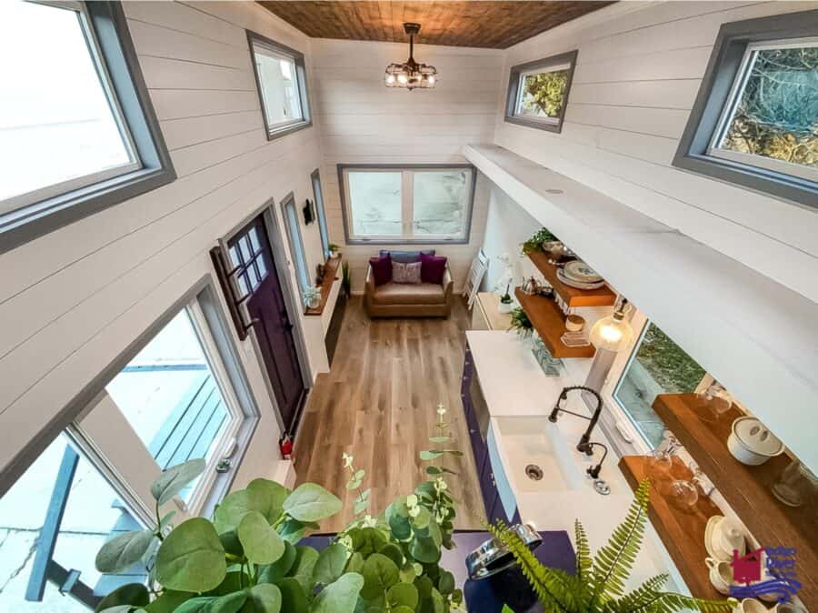 Compact tiny house living space with modern design.