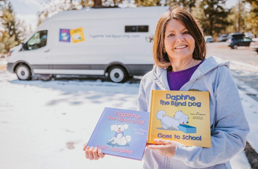 Author & Blind Dog on Book Tour in a Van