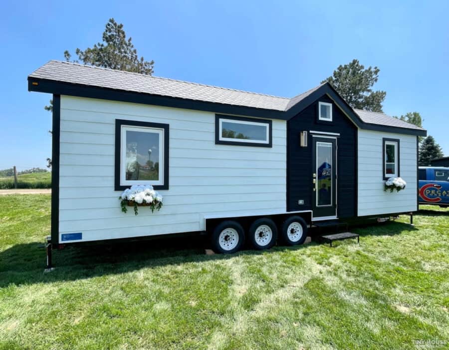 Tiny house with first-floor bedroom and modern exterior design.