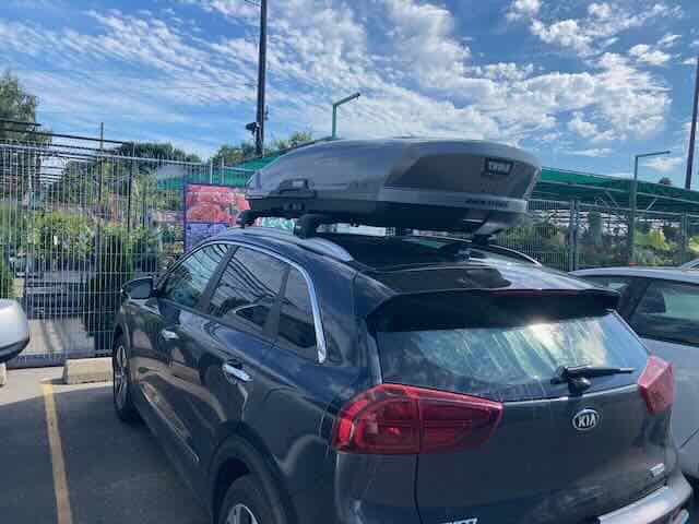 Electric Kia Niro EV camper on a small car.