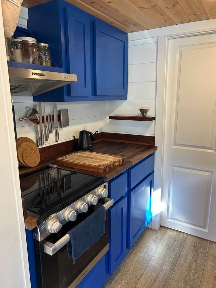 Bold Blue Double Loft THOW in Tiny House Village 26