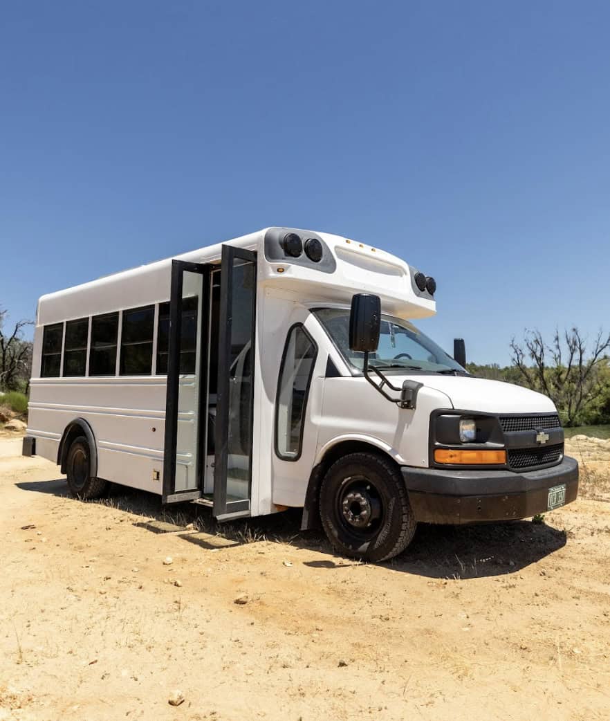 Bus conversion tiny house on wheels for mobile living and work. Compact, eco-friendly, and versatile.