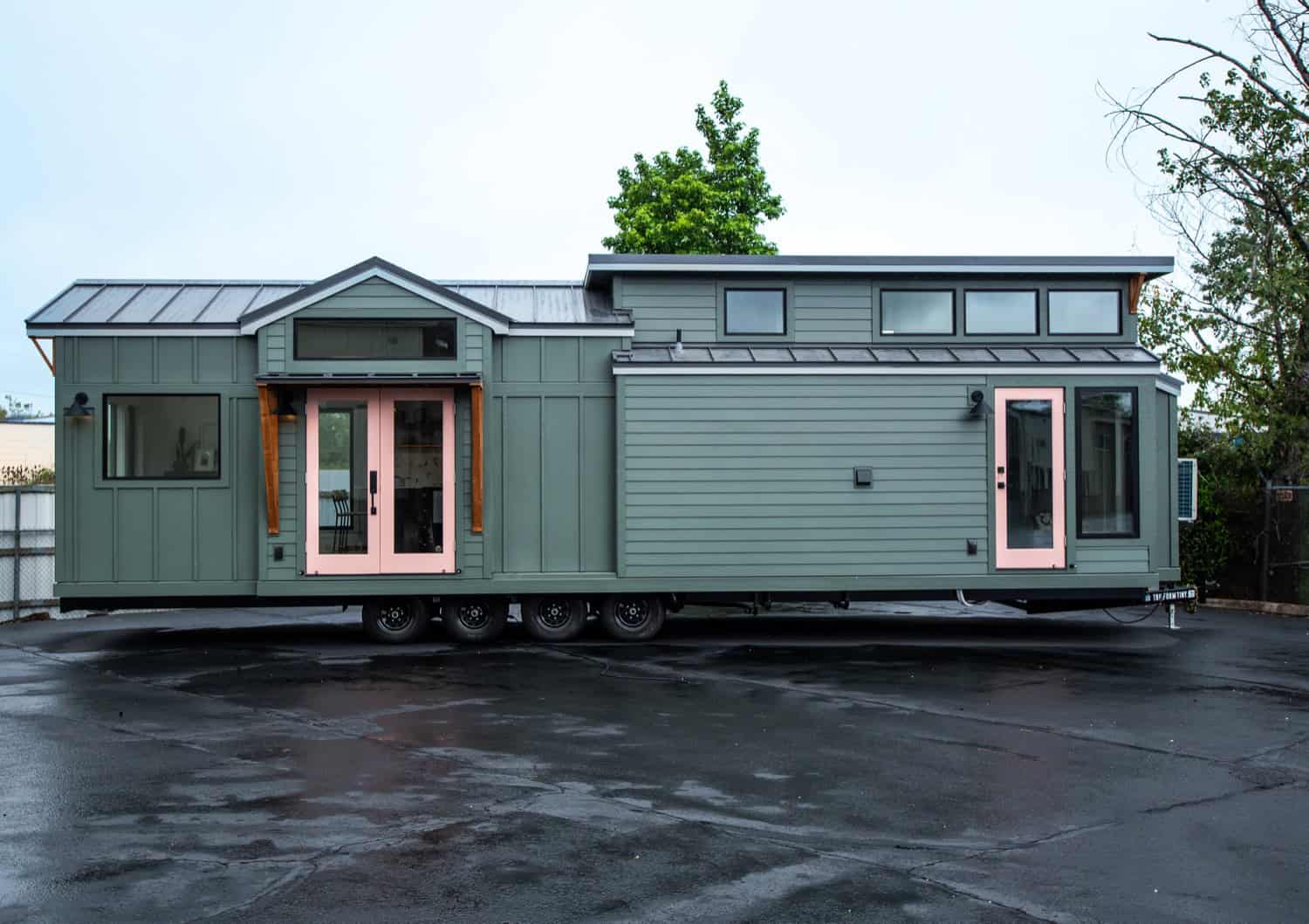 Cascade Max park model tiny home by Tru Form Tiny with Pewter Green siding and charcoal standing-seam metal roof