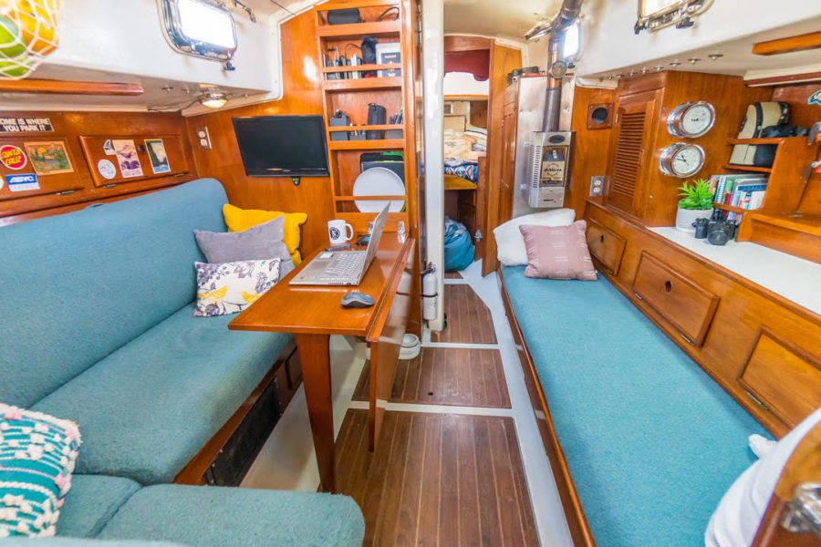 Catching Dinner & Baking Bread on their 220 sq. ft. Sailboat Home