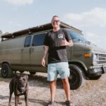 Van life with dog and cat in a converted Chevy van.