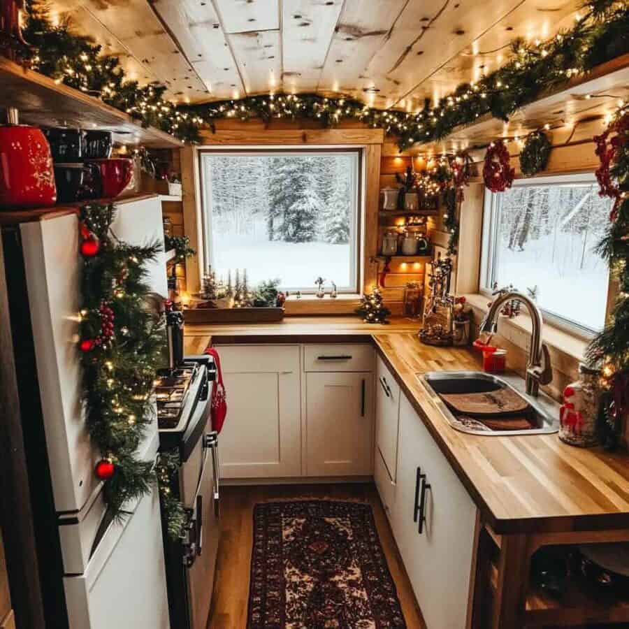 Cozy tiny house kitchen with holiday textiles and warm lighting