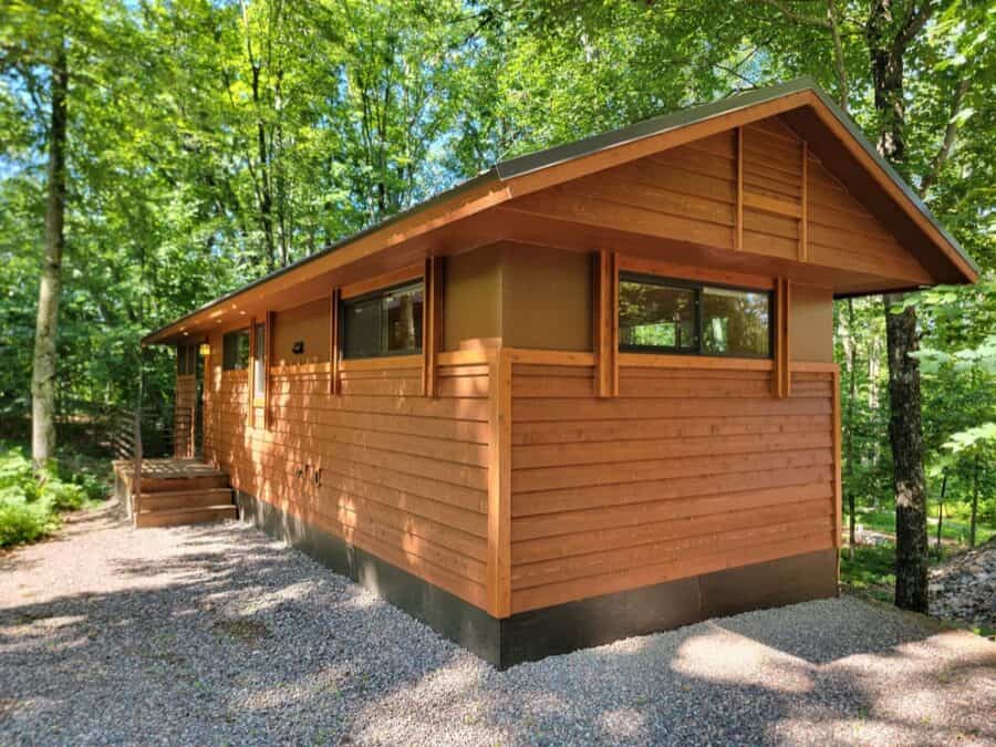 Tiny house in a wooded setting at Canoe Bay Village, Wisconsin.