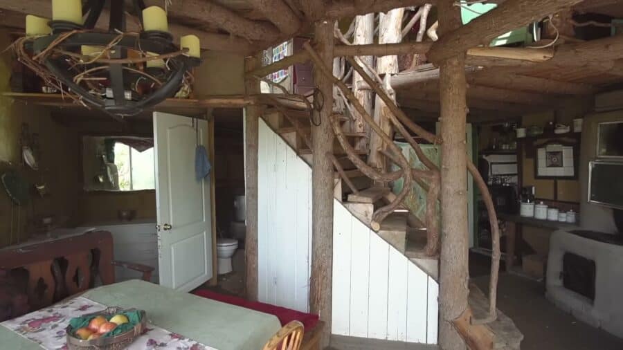 Hand-built cedar staircase and timber frame in the west wing