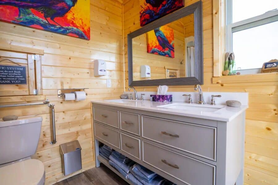 Double vanity sinks in the shared bathroom facility