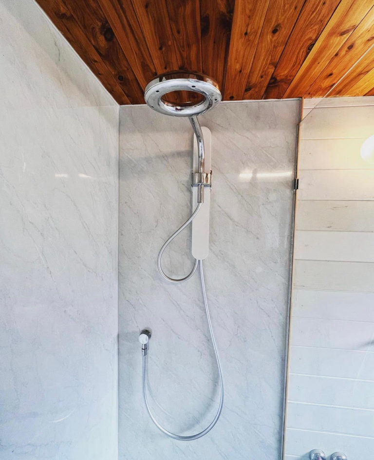Image showcasing Completely Off-Grid DIY Tiny Home w/ Rainwater Catchment