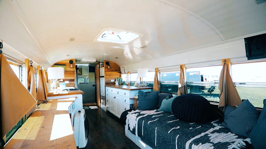 Couple Sell House To Build School Bus Conversion Sloth High Five via Tiny Home Tours YouTube 004