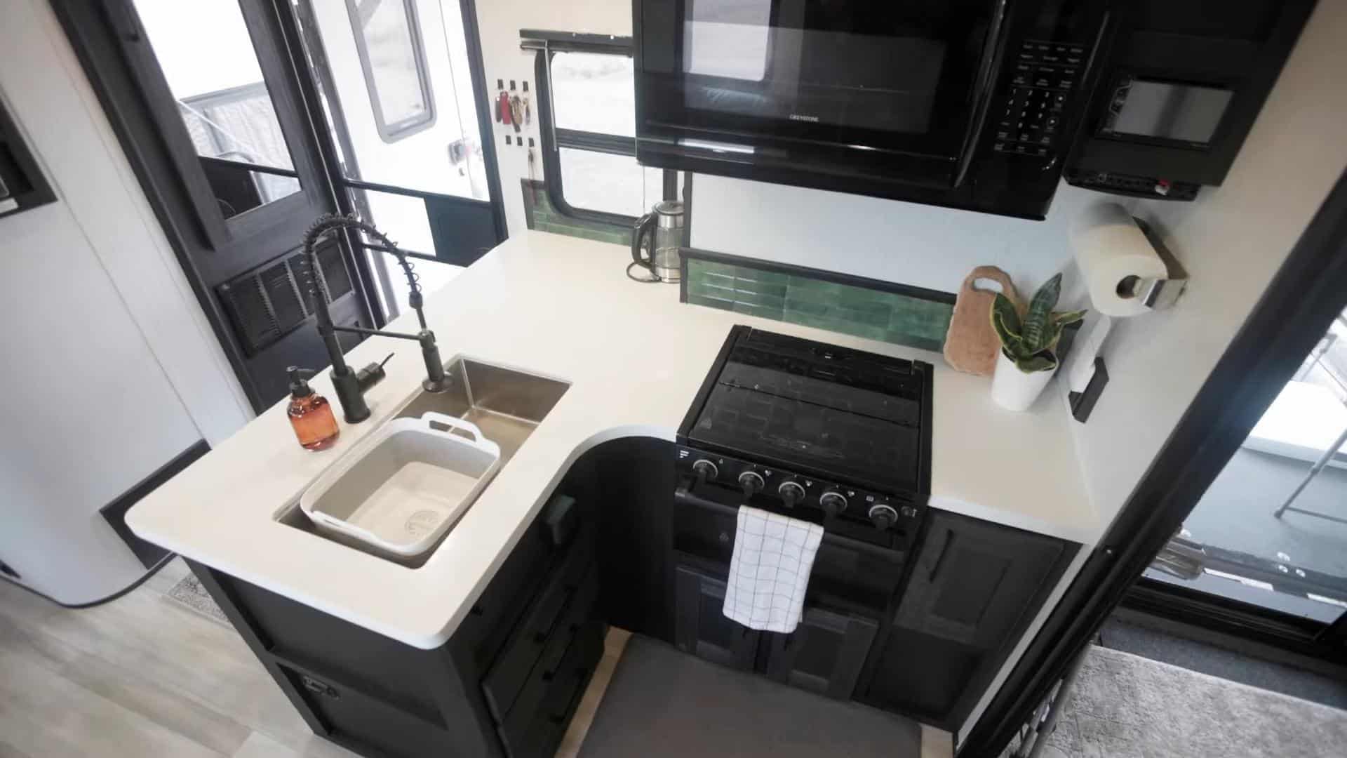 Couple’s Incredible RV with Fold-Down Deck