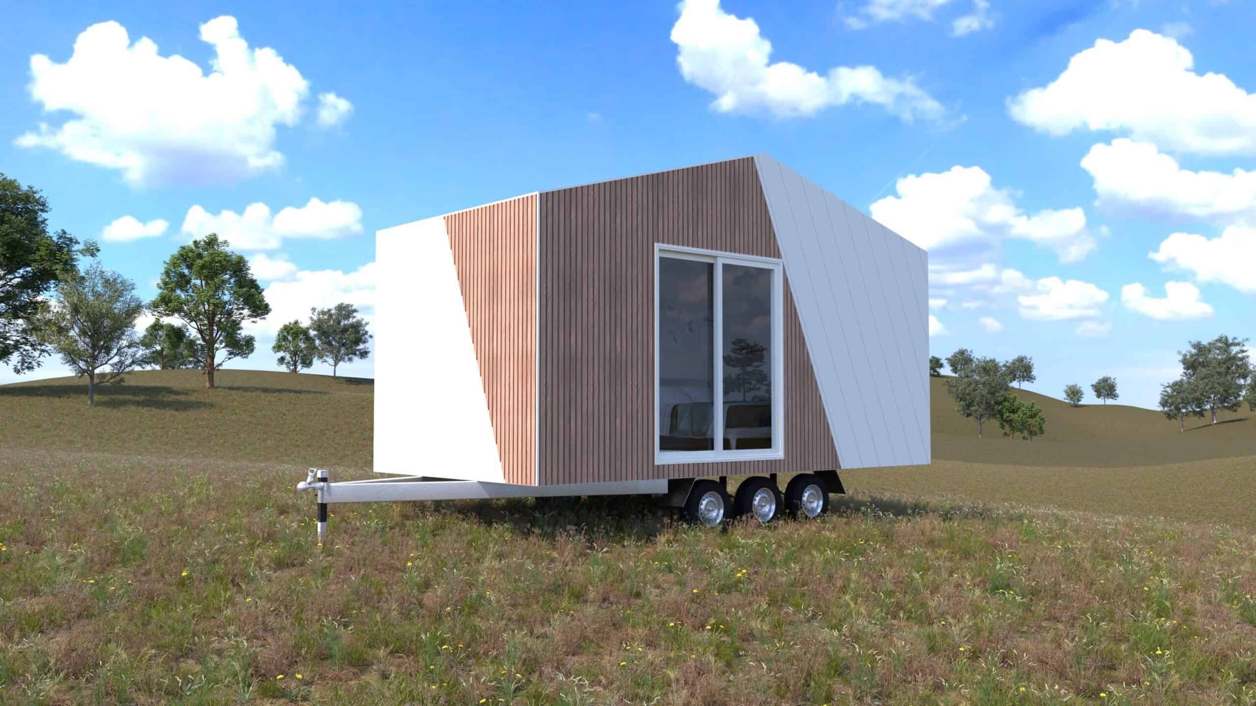 Render of the Cub tiny house by CozyCo showing timber-look vertical cladding, white aluminium panels cut on a diagonal, a large sliding window, and a triple-axle trailer in a grassy field