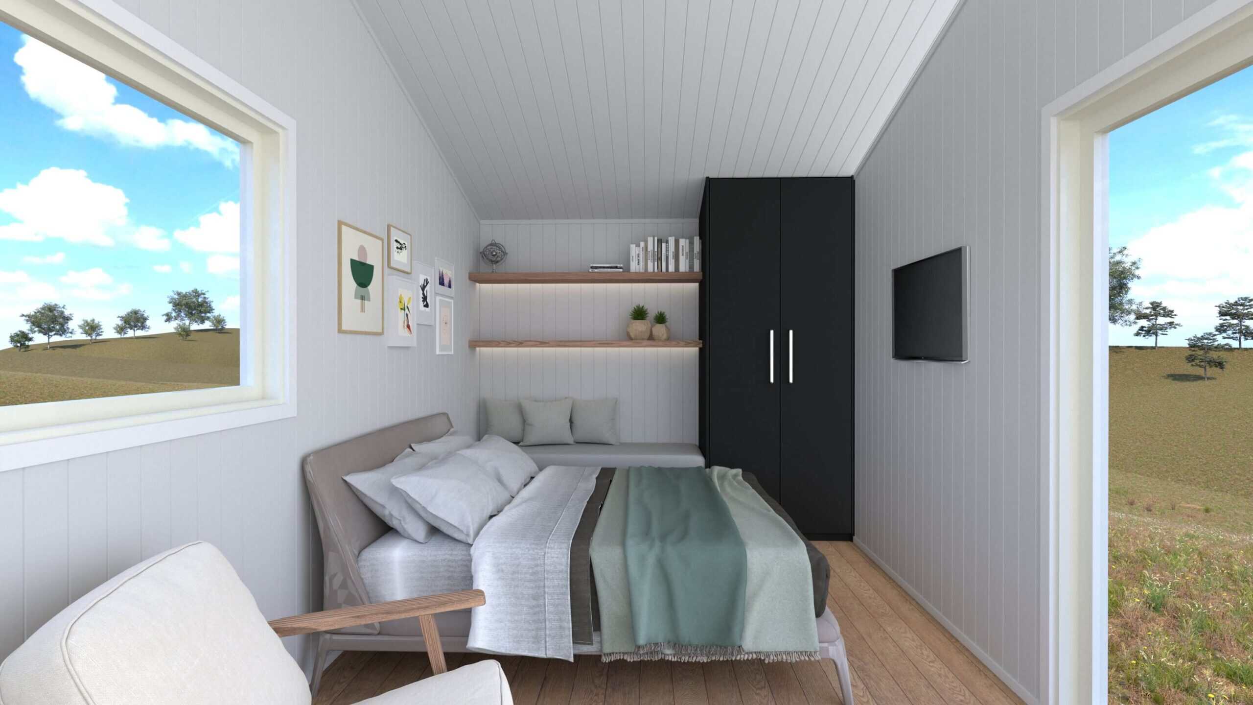 Interior render of the Cub tiny house showing a double bed, tall black wardrobe, timber floating shelves with concealed lighting, wall-mounted TV, and white VJ paneling under a raked ceiling