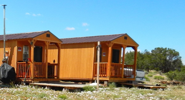 Man builds two off grid tiny cabins