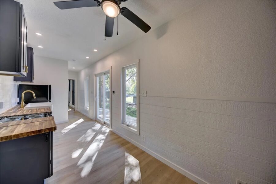 Modern interior of a double shipping container home in Brenham, Texas, showcasing spacious living ar.