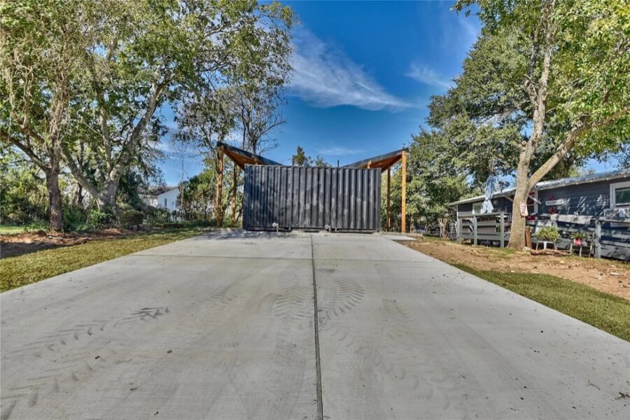Shipping container home in Brenham, Texas, showcasing efficient use of space and modern design.