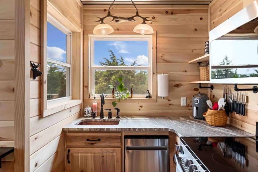Cozy Eagles Nest Cabin kitchen with natural wood finishes and scenic mountain views.