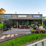 Tiny house with a meditation loft and outdoor patio area.