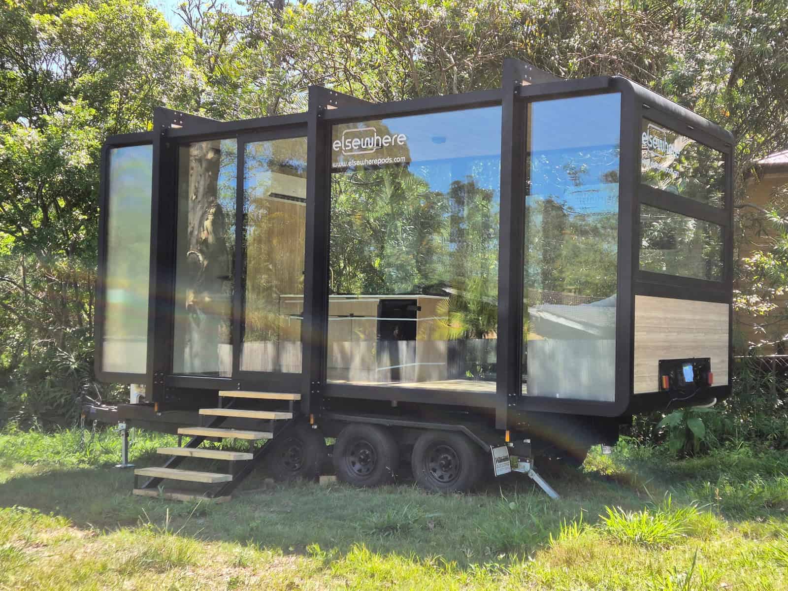 Elsewhere Pods 6m Tiny Home on Wheels parked in bushland on a tandem-axle trailer