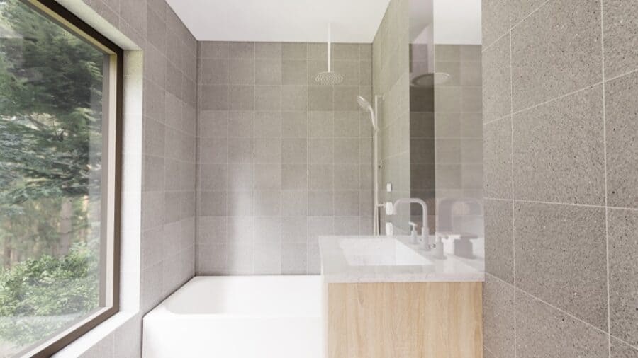 Interior view of a forest-ready tiny cabin with modern bathroom fixtures.