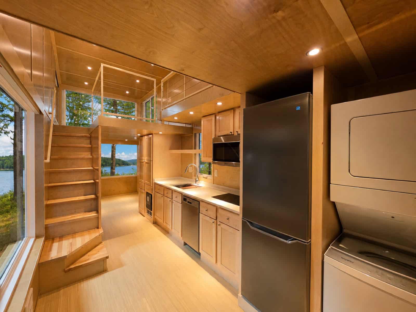 Interior of the Escape eONE Limited Edition showing the staircase, galley kitchen and stacked washer dryer